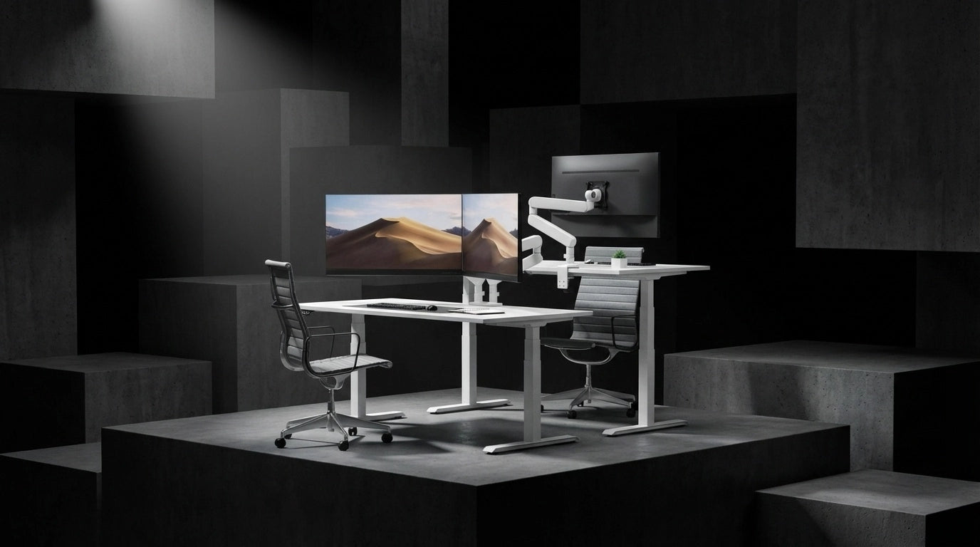 A Sunaofe height-adjustable desk with dual monitors and ergonomic chairs in a modern office setting.