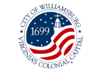 Logo of the City of Williamsburg, Virginia's Colonial Capital, featuring stars and stripes design.