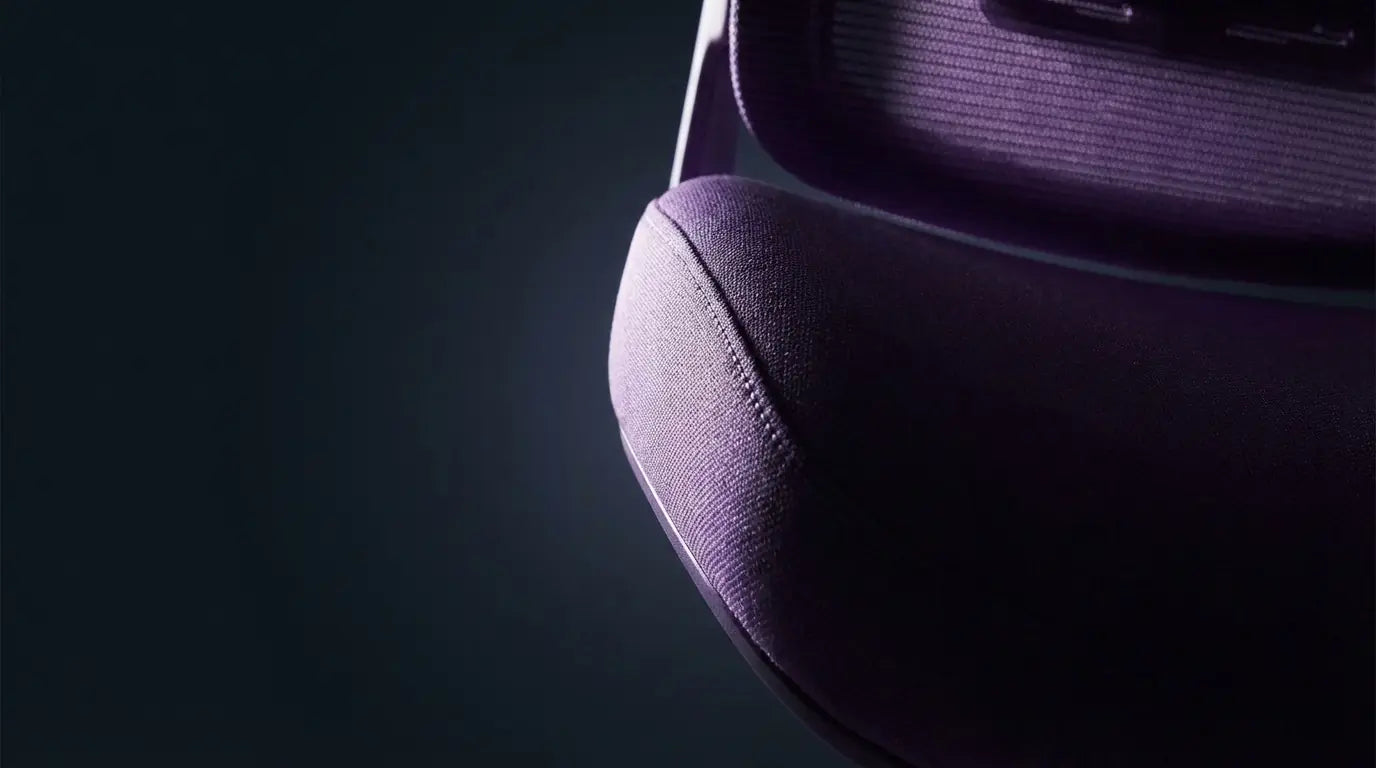 A close-up detail of a purple Sunaofe office chair showcasing its texture and design.